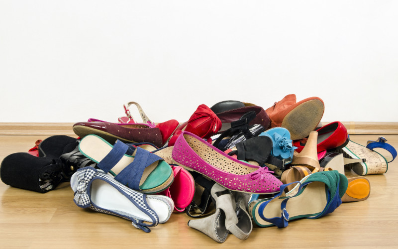 decluttering client's home - pile of mismatched shoes