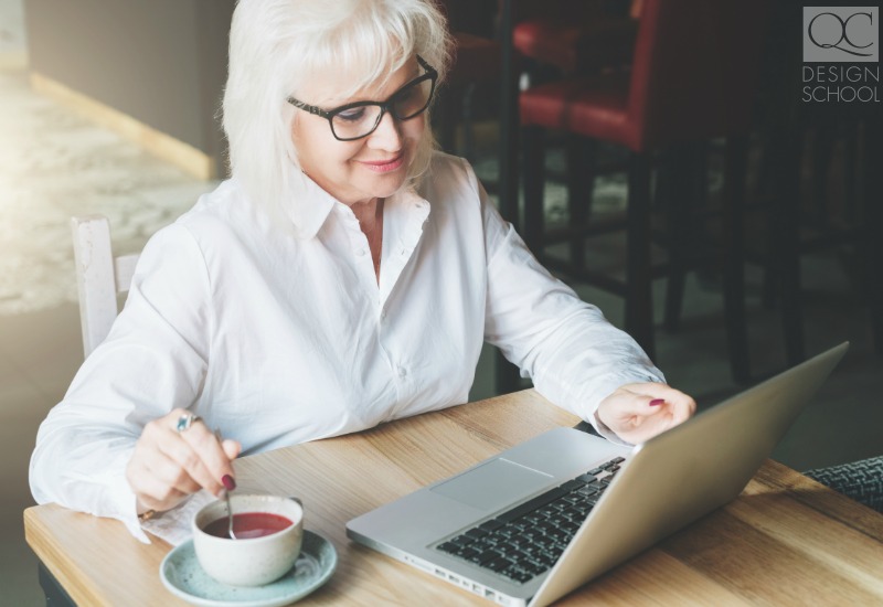 old woman studying home design online