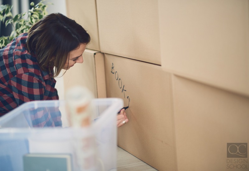 woman packing boxes