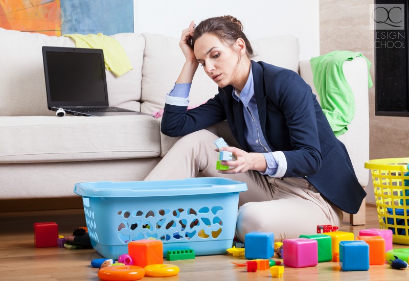 becoming a professional organizer busy mother cleaning up toys clutter in her living room