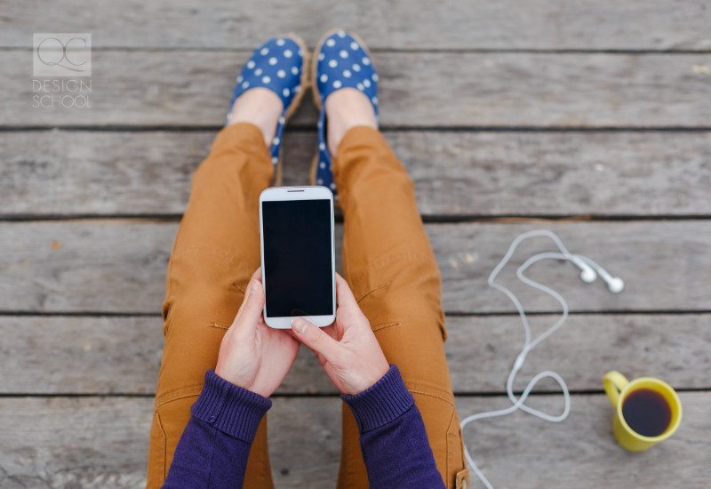 woman on her phone using it for many personal and professional purposes