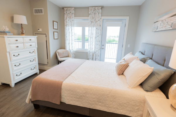 Bedroom model suite Aquatria Retirement Residence - Staging and Design by QC Design School graduate Chantal Marion