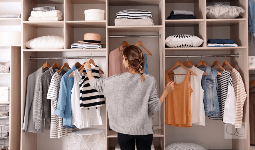 professional organizer straightening out closet