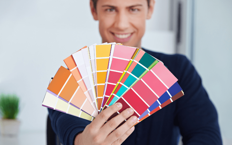 professional color consultant holding up swatches