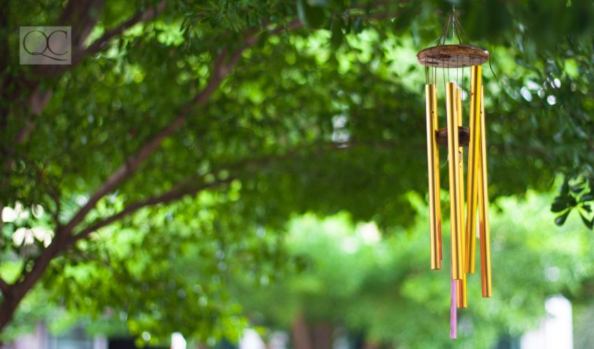 Gold wind bell under the tree.