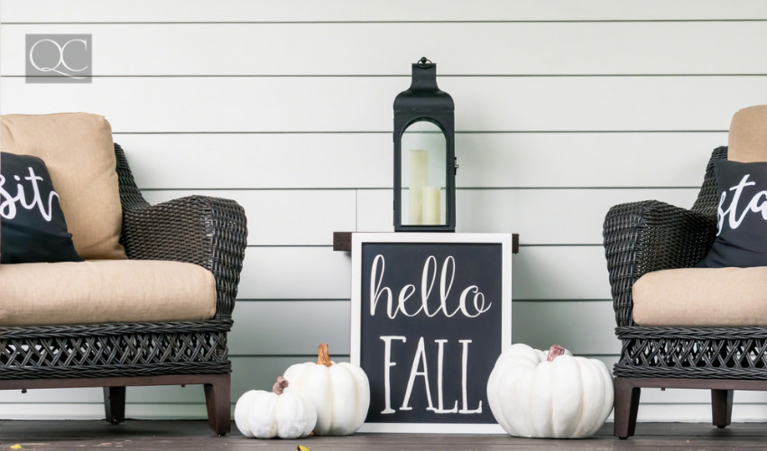 front porch decorating with hello fall chalkboard sign white pumpkins and chairs